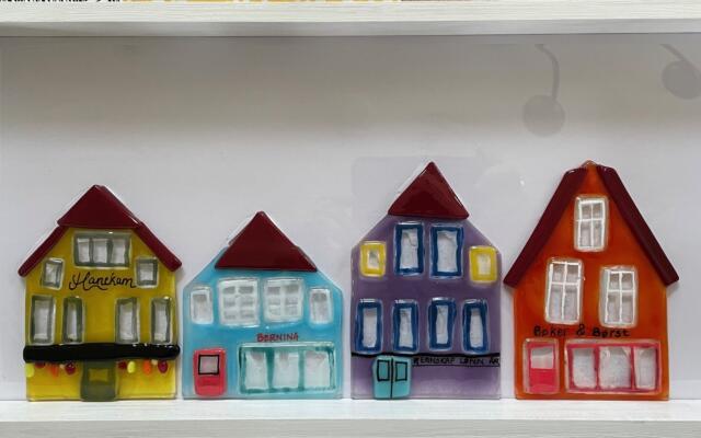 Lykkeli glasskunst hus